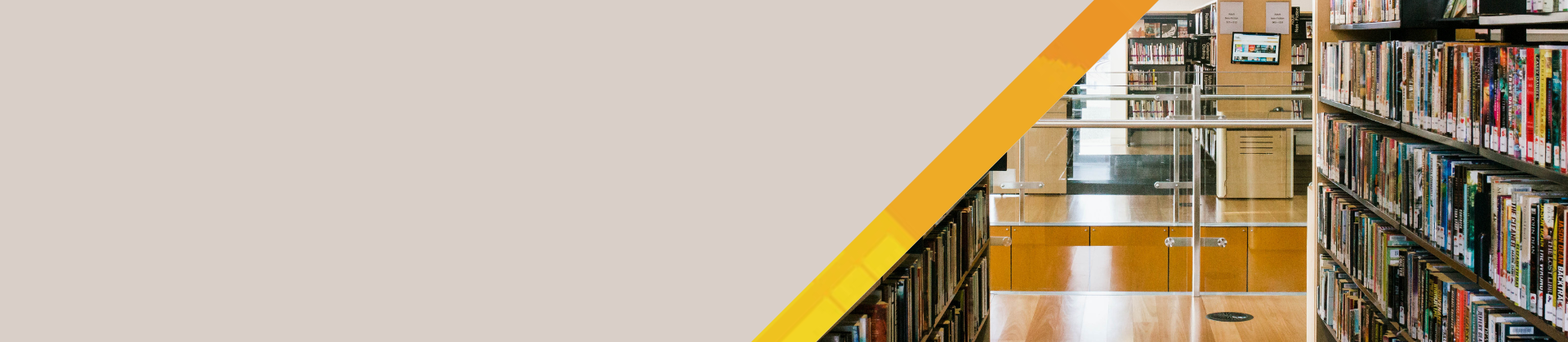 Website banner depicting a photo of library shelves and a graphic orange and yellow line