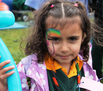 Child with face painted