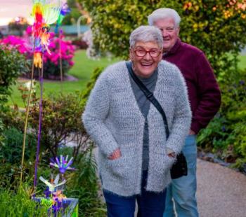 An elderly couple enjoying the lights at the Morwell Rose Garden Festival.