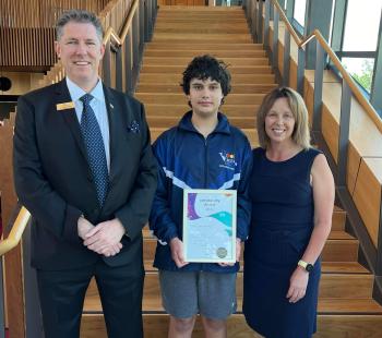 Latrobe City Mayor Darren Howe and Deputy Mayor Tracie Lund standing with 2024 Australia Day Awards recipient