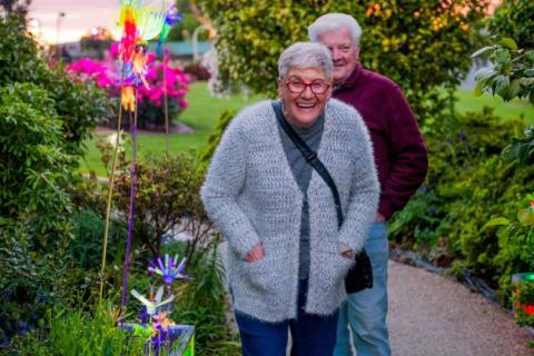 An elderly couple enjoying the lights at the Morwell Rose Garden Festival.